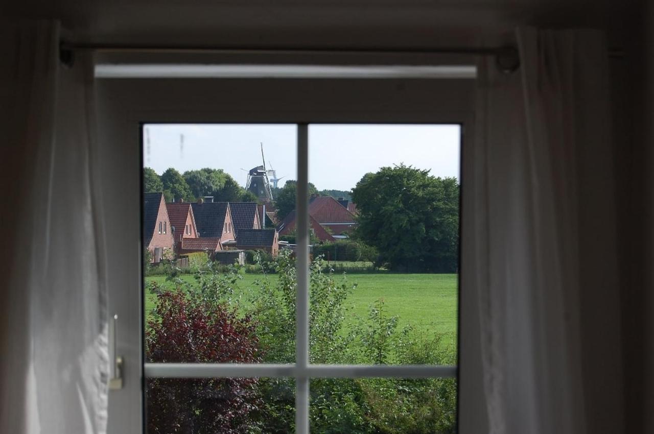 Ferienwohnung Im Gulfhof Krummhörn 外观 照片